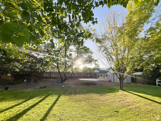 920 S 940 W, Richfield, UT 84701 - fenced backyard with an outbuilding and a trampoline