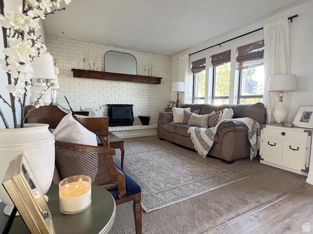 920 S 940 W, Richfield, UT 84701 - living area featuring wood finished floors and a wood stove