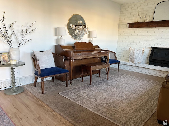 920 S 940 W, Richfield, UT 84701 - living area featuring wood finished floors and a wood stove