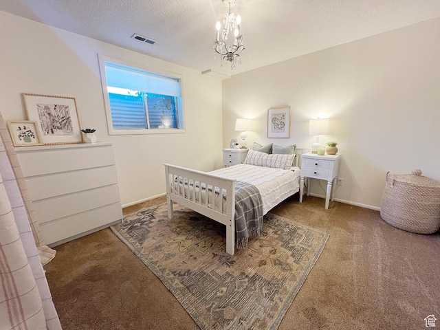 920 S 940 W, Richfield, UT 84701 - bedroom featuring carpet floors, a chandelier, and a textured ceiling