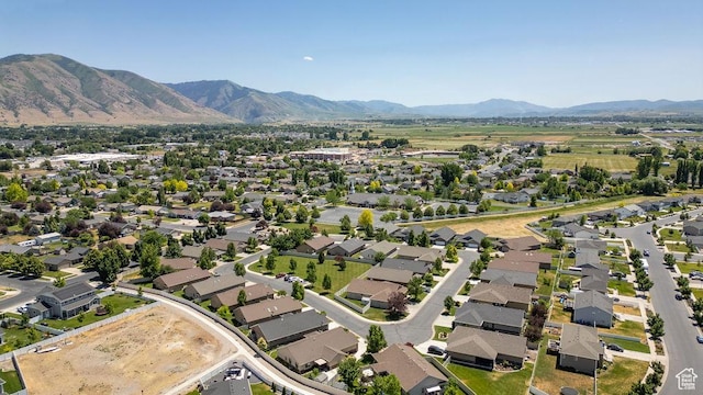 1065 W 2740 S, Nibley, UT 84321 - aerial view of property's location featuring a mountainous background and nearby suburban area