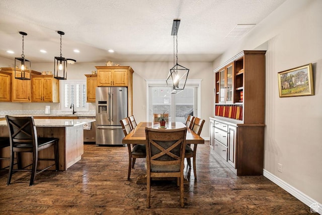 1065 W 2740 S, Nibley, UT 84321 - dining room featuring recessed lighting, dark wood-type flooring, and a textured ceiling