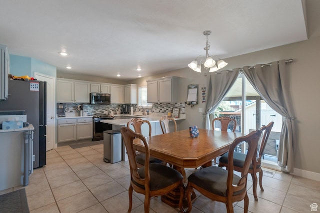 2714 E Stony Hill Way S, Spanish Fork, UT 84660 - dining space featuring a chandelier, light tile patterned floors, and recessed lighting