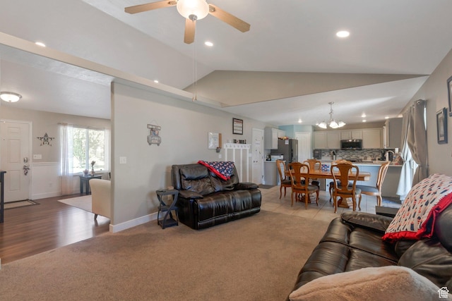 2714 E Stony Hill Way S, Spanish Fork, UT 84660 - living area with lofted ceiling, light carpet, a ceiling fan, a chandelier, and recessed lighting