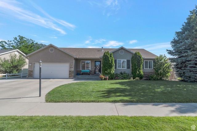 2714 E Stony Hill Way S, Spanish Fork, UT 84660 - ranch-style house with driveway, stone siding, a garage, and stucco siding