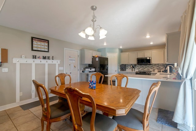 2714 E Stony Hill Way S, Spanish Fork, UT 84660 - dining area featuring a chandelier, light tile patterned floors, and recessed lighting
