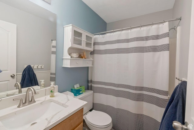 2714 E Stony Hill Way S, Spanish Fork, UT 84660 - full bath with vanity, a shower with curtain, and wainscoting