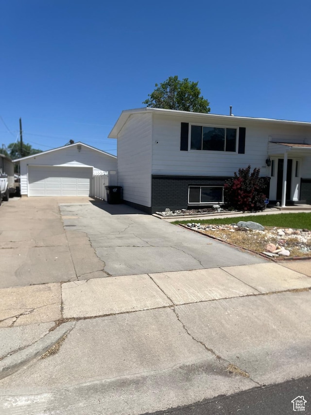 390 W 5050 S, Washington Terrace, UT 84405 - view of front of property with a garage and an outbuilding