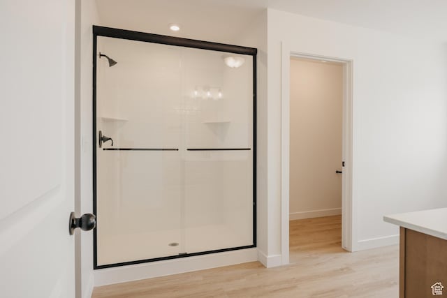 189 N Woodrun Way Unit 131, Saratoga Springs, UT 84045 - full bath featuring a shower stall, wood finished floors, and vanity