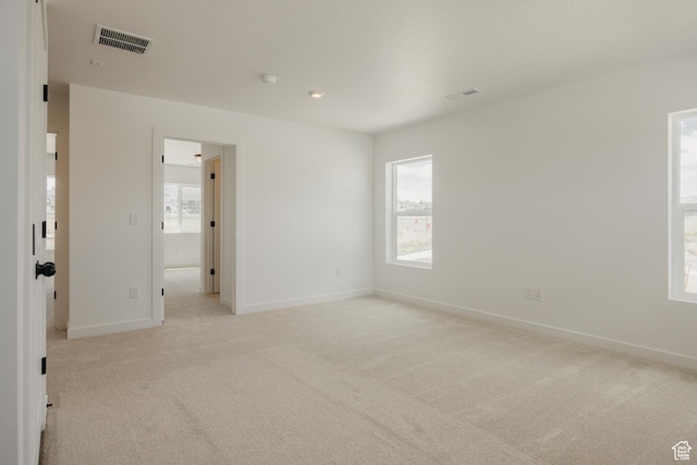 189 N Woodrun Way Unit 131, Saratoga Springs, UT 84045 - spare room featuring light carpet and a smoke detector