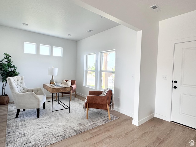 189 N Woodrun Way Unit 131, Saratoga Springs, UT 84045 - sitting room featuring light wood-style floors and baseboards