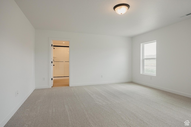 189 N Woodrun Way Unit 131, Saratoga Springs, UT 84045 - empty room with carpet flooring and baseboards