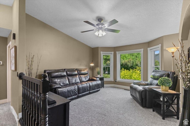 980 E 2850 N, North Logan, UT 84341 - living room with carpet flooring, a ceiling fan, and a textured ceiling
