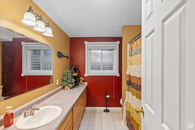 980 E 2850 N, North Logan, UT 84341 - bathroom featuring vanity, a textured ceiling, and a shower with shower curtain