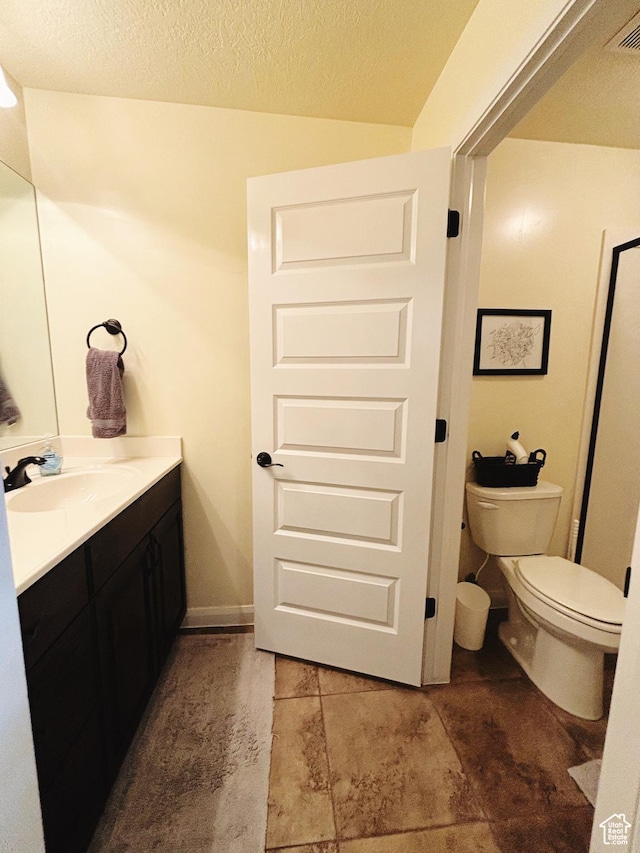 3853 Mitchell Dr, Santa Clara, UT 84765 - bathroom with vanity and a textured ceiling