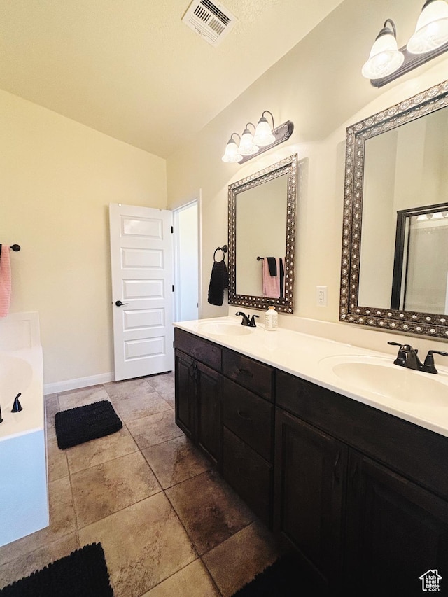 3853 Mitchell Dr, Santa Clara, UT 84765 - bathroom featuring double vanity and a tub