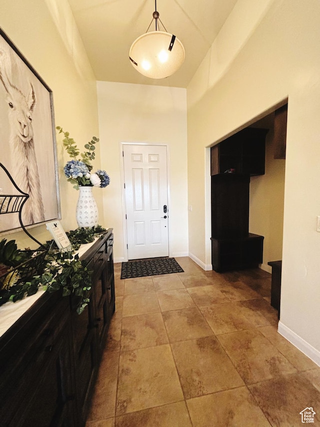 3853 Mitchell Dr, Santa Clara, UT 84765 - entrance foyer featuring baseboards and a towering ceiling