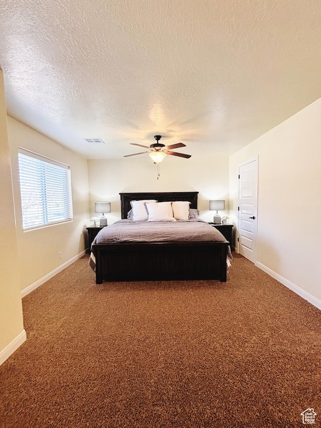 3853 Mitchell Dr, Santa Clara, UT 84765 - bedroom featuring carpet flooring, a textured ceiling, and a ceiling fan