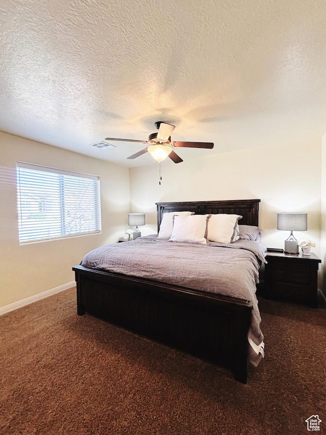 3853 Mitchell Dr, Santa Clara, UT 84765 - carpeted bedroom with a textured ceiling and ceiling fan