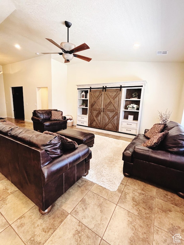 3853 Mitchell Dr, Santa Clara, UT 84765 - living area featuring ceiling fan, vaulted ceiling, light tile patterned flooring, a textured ceiling, and recessed lighting