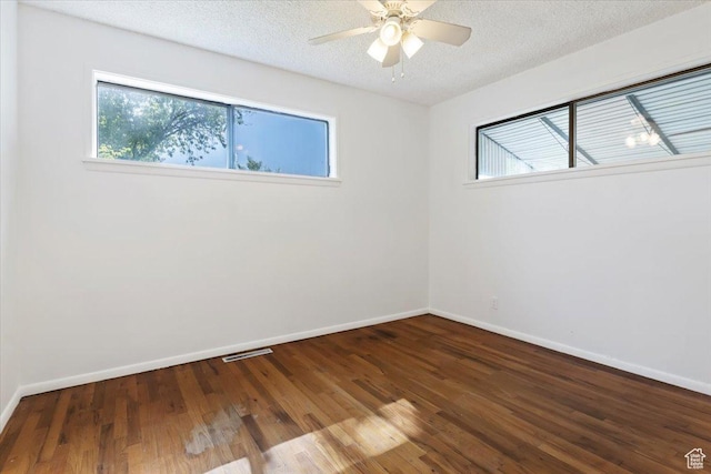 1349 W Goodwin Ave N, Salt Lake City, UT 84116 - empty room with plenty of natural light, wood finished floors, ceiling fan, and a textured ceiling