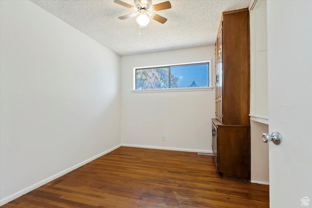 1349 W Goodwin Ave N, Salt Lake City, UT 84116 - unfurnished room with ceiling fan, a textured ceiling, and dark wood-type flooring