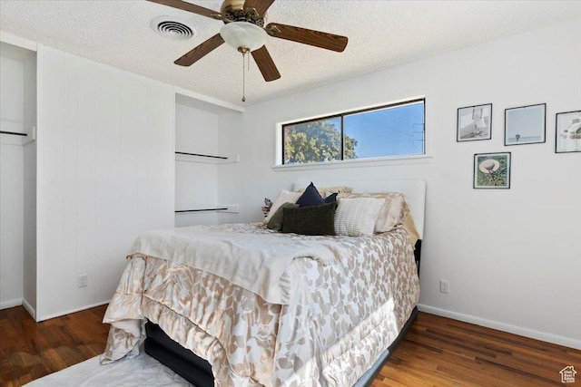 1349 W Goodwin Ave N, Salt Lake City, UT 84116 - bedroom with wood finished floors, a textured ceiling, and ceiling fan