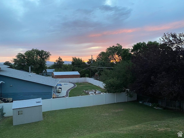 2077 Fillmore Ave, Ogden, UT 84401 - fenced backyard featuring a shed