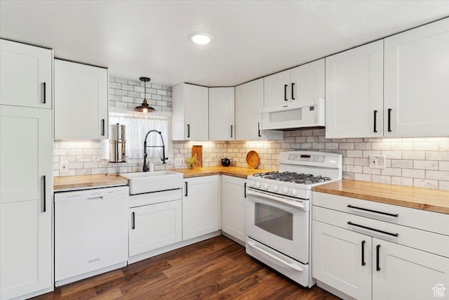 2077 Fillmore Ave, Ogden, UT 84401 - kitchen with white appliances, wood counters, tasteful backsplash, and white cabinets