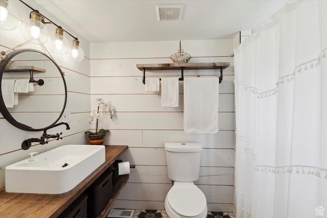 2077 Fillmore Ave, Ogden, UT 84401 - full bathroom with vanity and curtained shower