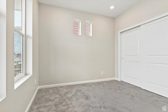 6168 W Franciscotti Dr Unit 605, South Jordan, UT 84009 - unfurnished bedroom with carpet flooring and a closet
