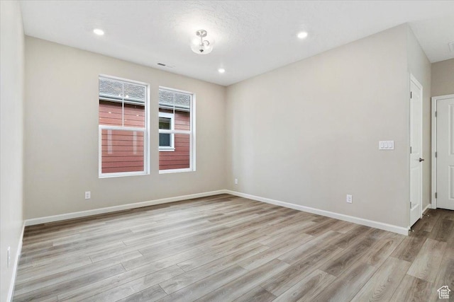 6168 W Franciscotti Dr Unit 605, South Jordan, UT 84009 - unfurnished room with wood finished floors and recessed lighting