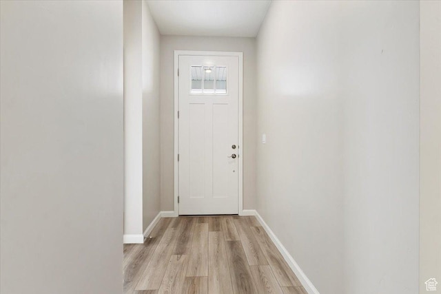 6168 W Franciscotti Dr Unit 605, South Jordan, UT 84009 - doorway featuring light wood finished floors and baseboards