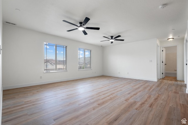 3812 E Rock Creek Rd Unit 5, Eagle Mountain, UT 84005 - unfurnished room featuring a ceiling fan and light wood-style flooring