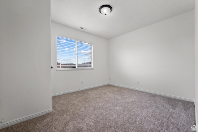 3812 E Rock Creek Rd Unit 5, Eagle Mountain, UT 84005 - spare room featuring carpet flooring and baseboards