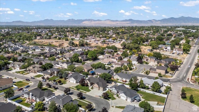 6264 S Dellron Dr, Murray, UT 84123 - aerial view of property's location featuring a mountainous background and nearby suburban area