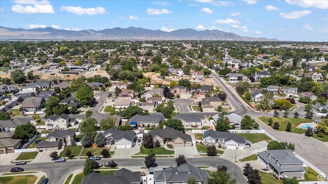 6264 S Dellron Dr, Murray, UT 84123 - aerial overview of property's location featuring a mountain backdrop and nearby suburban area