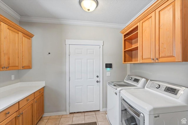 6264 S Dellron Dr, Murray, UT 84123 - washroom featuring washing machine and clothes dryer, cabinet space, ornamental molding, and light tile patterned floors