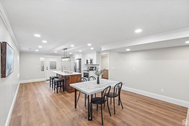 6264 S Dellron Dr, Murray, UT 84123 - dining area with ornamental molding, recessed lighting, and light wood-style flooring