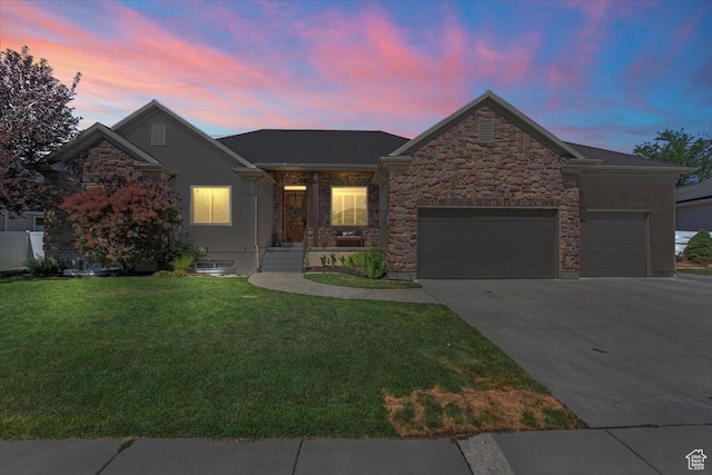 6264 S Dellron Dr, Murray, UT 84123 - ranch-style house featuring a garage, a front lawn, concrete driveway, and stone siding
