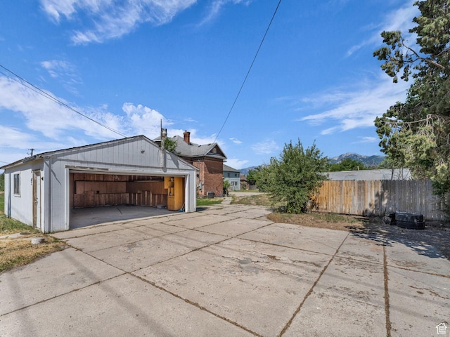13225 S Redwood Rd, Riverton, UT 84065 - view of side of home featuring a garage and an outdoor structure