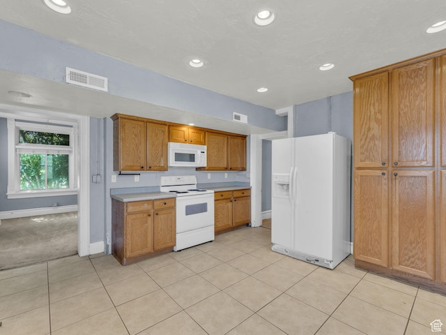 13225 S Redwood Rd, Riverton, UT 84065 - kitchen featuring white appliances, recessed lighting, light countertops, brown cabinets, and light tile patterned flooring