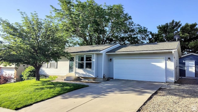 5373 W 6600 S, West Jordan, UT 84081 - single story home with a garage, concrete driveway, a front lawn, and entry steps