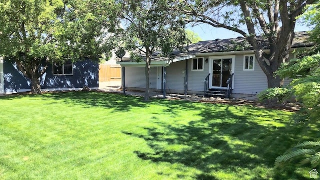 5373 W 6600 S, West Jordan, UT 84081 - rear view of property with entry steps