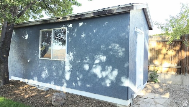 5373 W 6600 S, West Jordan, UT 84081 - view of home's exterior with an outbuilding and stucco siding