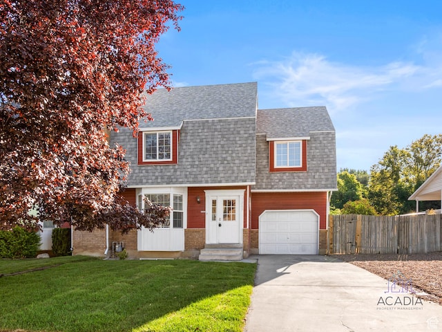 1285 S 550 E, Springville, UT 84663 - colonial inspired home with a shingled roof, concrete driveway, a garage, and brick siding