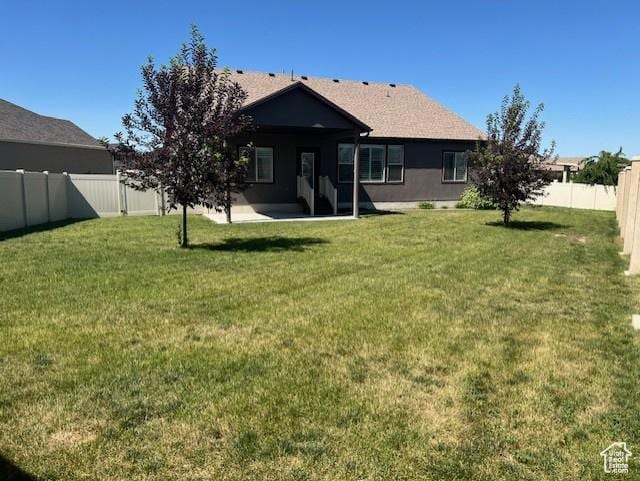 649 E 5650 S, Washington Terrace, UT 84405 - back of property with a fenced backyard, a patio, and stucco siding