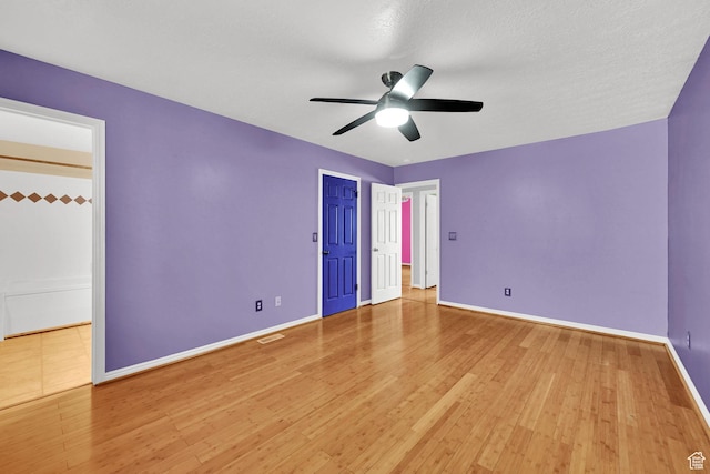 4188 S 2725 W, Roy, UT 84067 - unfurnished bedroom with light wood finished floors and a ceiling fan
