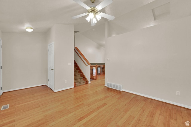 4188 S 2725 W, Roy, UT 84067 - unfurnished living room featuring light wood-type flooring, stairs, and ceiling fan