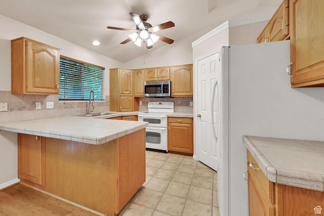 4188 S 2725 W, Roy, UT 84067 - kitchen featuring white appliances, a ceiling fan, backsplash, a peninsula, and light countertops